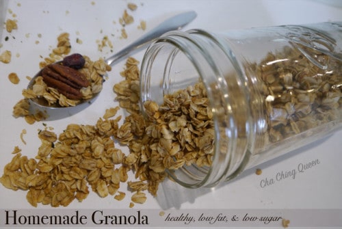 Easiest homemade granola in a jar with a spoon.