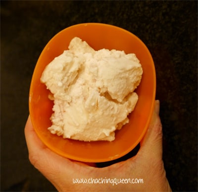 A person indulging in a bowl of homemade ice cream.