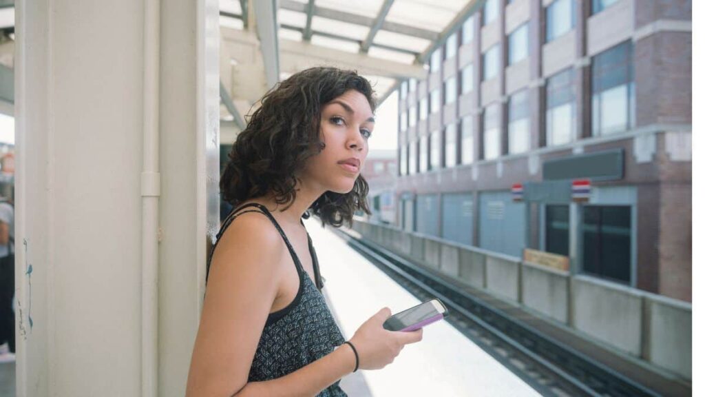 Best Way to Travel in Chicago; Woman Waiting for The L