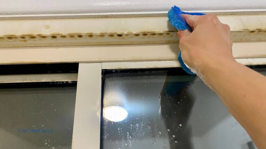 Easiest Way to Clean Vinyl Windows; Wiping dirt from vinyl window