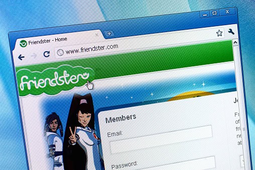 A web browser displays the Friendster homepage, featuring a login form for members to enter their email and password, alongside a graphic of characters in futuristic attire.